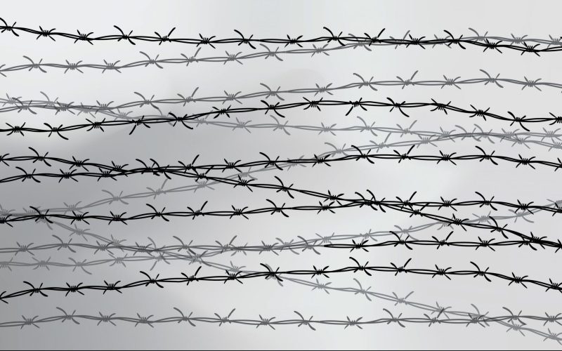 Barbed wire fencing. Fence made of wire with spikes. Black and white illustration to the holocaust.