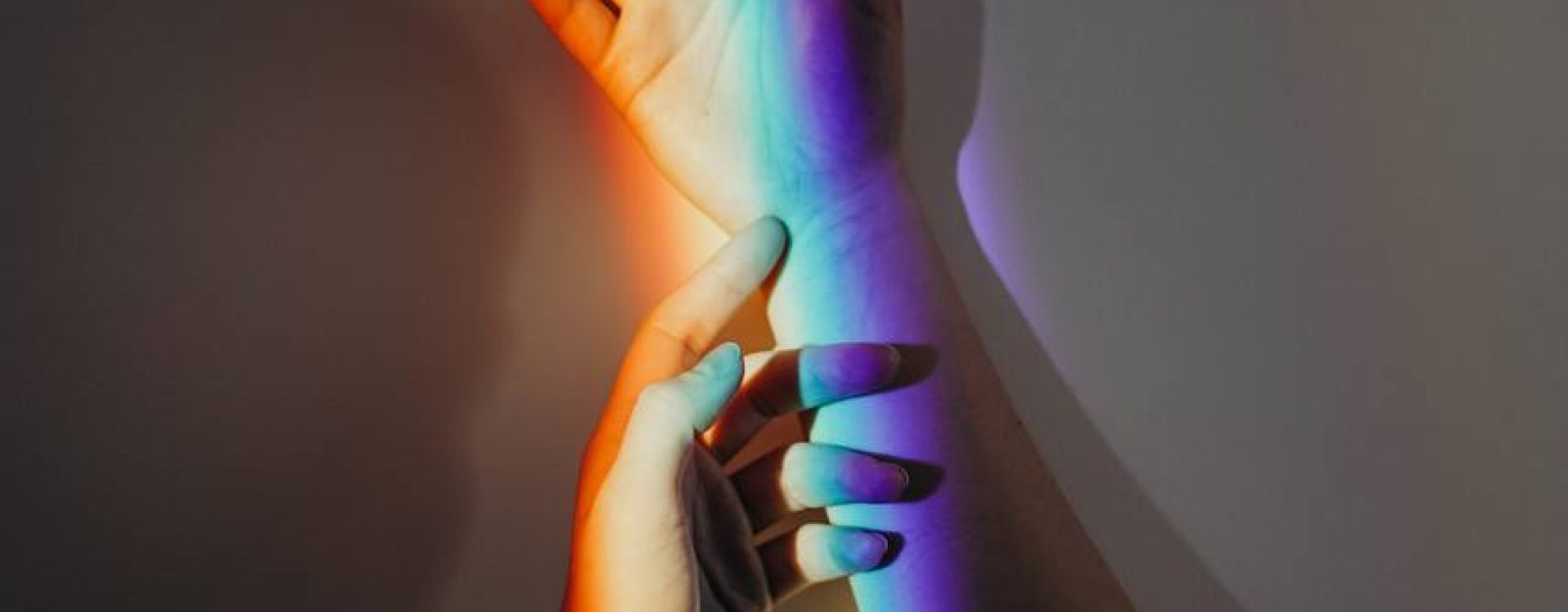 Persons Hands With Rainbow Colors